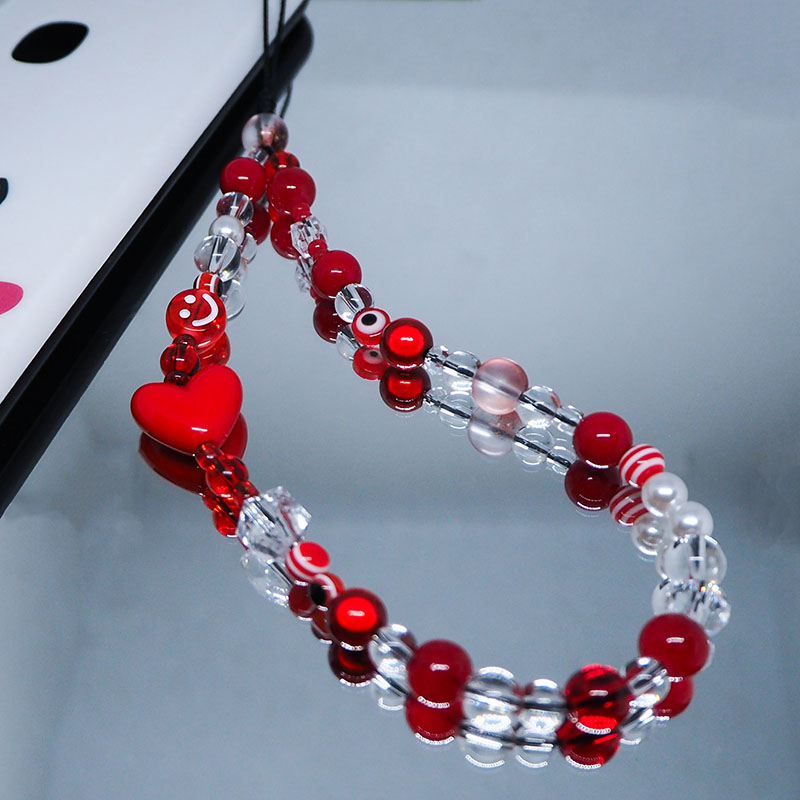 Czerwona przezroczysta mobilna – Pearl Trim Chain recenzja i cena